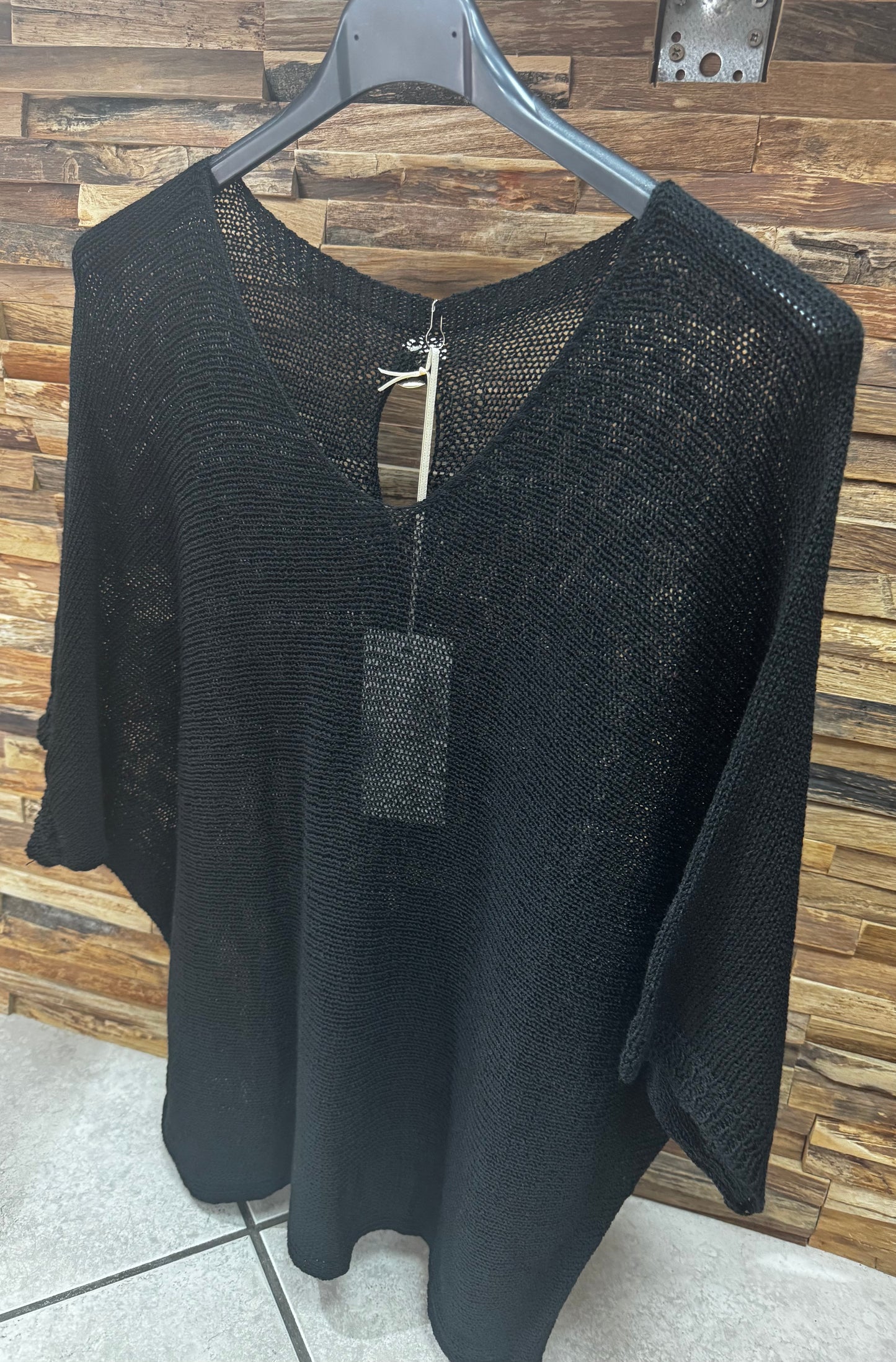Pull fin, boutons dans le dos